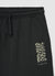 Jogger trousers with drawstring and lettering