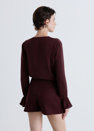 Blusa con volant similsatin