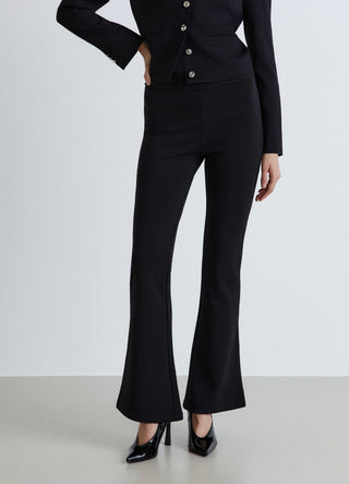 Flared long leggings with gathered elasticated waistband