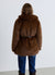 Manteau mi-long effet fourrure avec ceinture