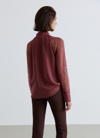 Blusa con fiocco e maniche in pizzo