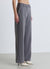 Pantalon palazzo avec strass all over