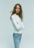 Jeans bootcut con borchie