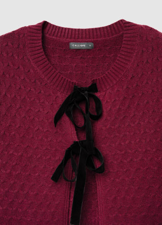 Cardigan crop in maglia con fiocchi