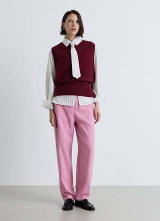 Gilet en maille unie avec boutons latéraux