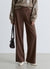 Pantaloni palazzo con patta asimmetrica
