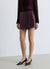 Gonna-pantalone con borchie