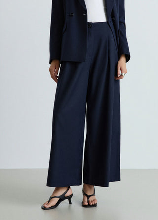 Cropped wide-leg culotte trousers with a herringbone pattern