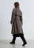 Over trench with belt