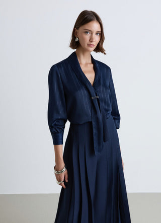 Blusa con rever sciallato a righe