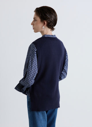 Gilet en maille uni avec boutons latéraux