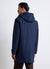 Hooded parka with covered closure