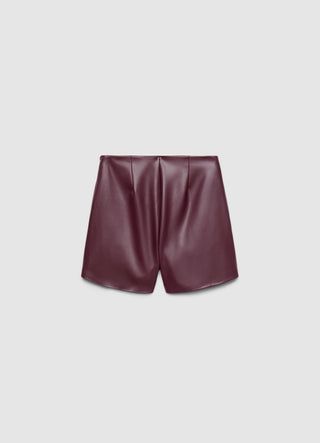 Gonna-pantalone con borchie