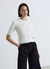 T-shirt in maglia a trecce con bottoni sulle spalle