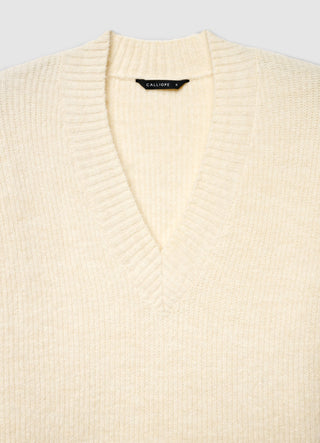 Pull doux à col en V avec dentelle à la base
