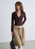 Cropped bustier shirt with V-neckline