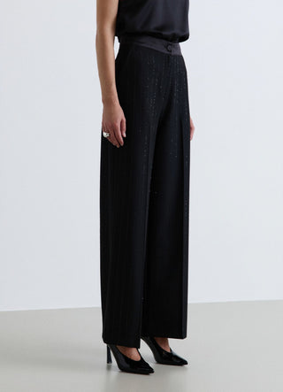 Pantaloni palazzo gessati con paillettes