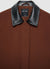 Giacca con colletto effetto pelle e tasche con patta