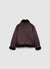 Giacca effetto montone con zip asimmetrica