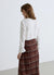 Blouse avec volant en simili satin