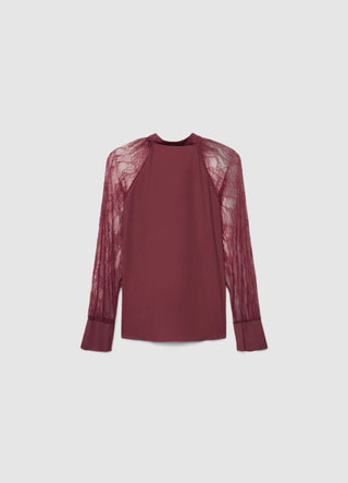 Blusa con fiocco e maniche in pizzo
