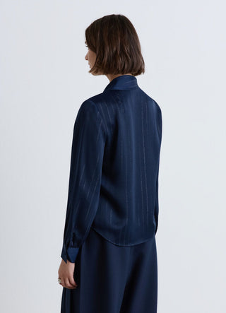Blusa con rever sciallato a righe