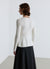 Cardigan peplo con bottoni