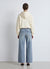 Jeans palazzo con inserti decorativi