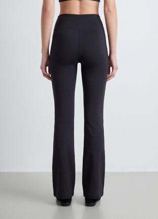 Solid colour long flared leggings