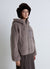 Giubbotto teddy con cappuccio e zip
