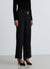 Pantaloni harem con drappeggio e spilla