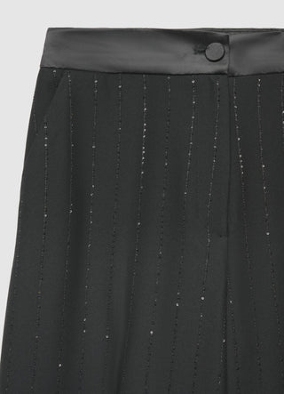 Pantaloni palazzo gessati con paillettes