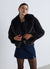 Giacca crop effetto peluche con collo rever