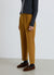 Pantaloni con pinces e vita elasticizzata