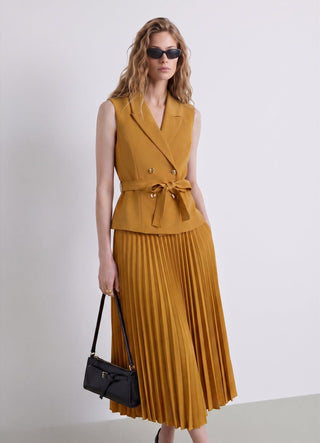 Dress with a fitted bodice vest and pleated skirt