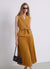 Dress with a fitted bodice vest and pleated skirt