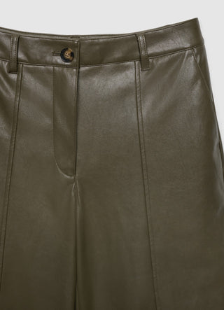 Shorts bermuda a tinta unita con impunture